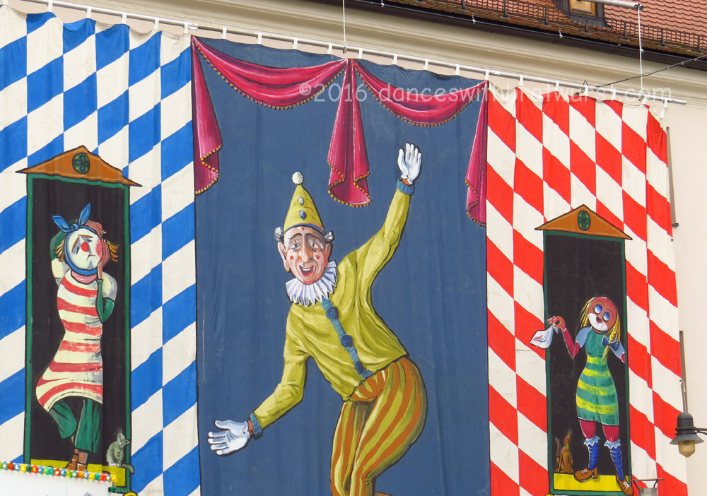 Clown backdrop on the city hall.