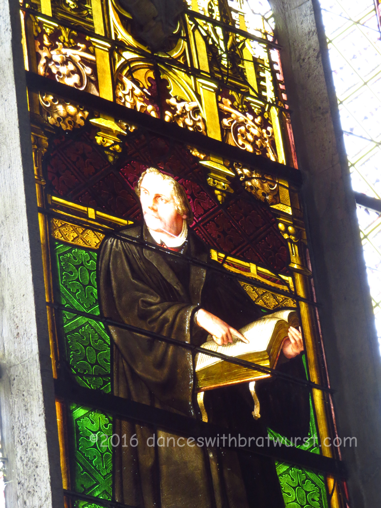 The stained glass windows all featured important figures of the Reformation.