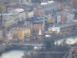 View of the Inn (the river) and a Christmas market.